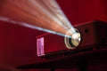 Mini Projector displaying on table